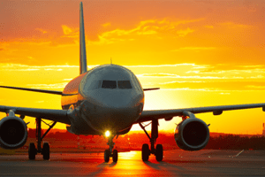 avião pôr do sol luz