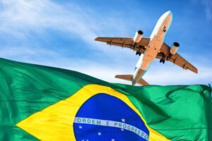 Avião e a bandeira do Brasil