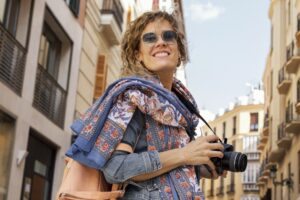 Turista com máquina fotográfica