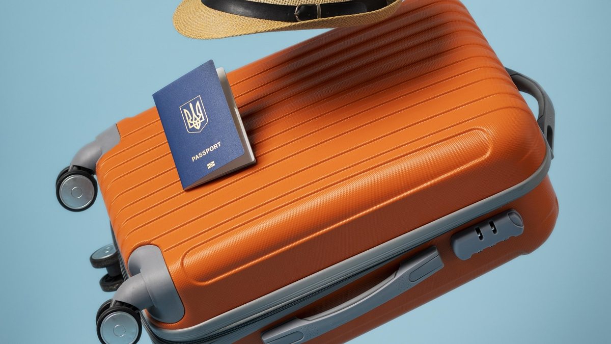 mala de viagem e passaporte