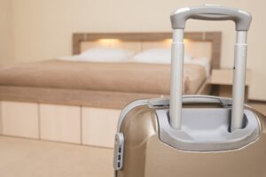 mala e cama no hotel